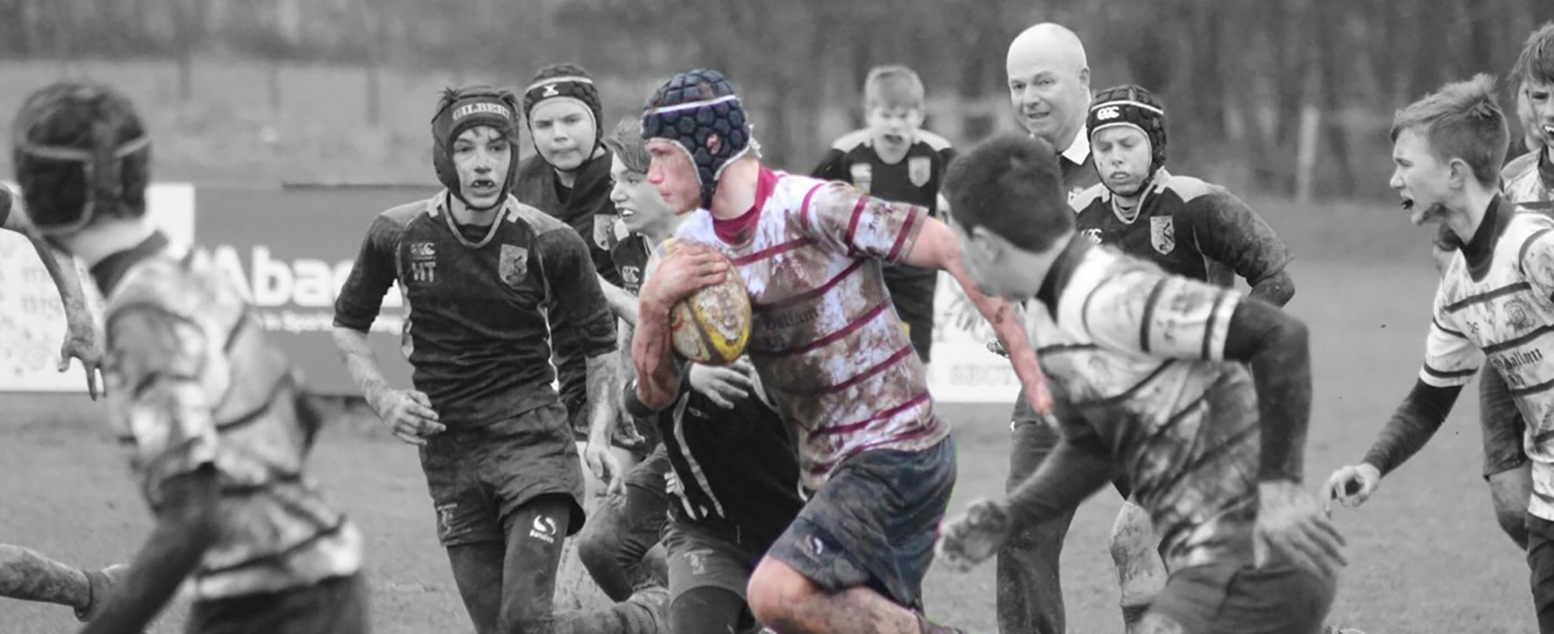 A group of boys playing rugby